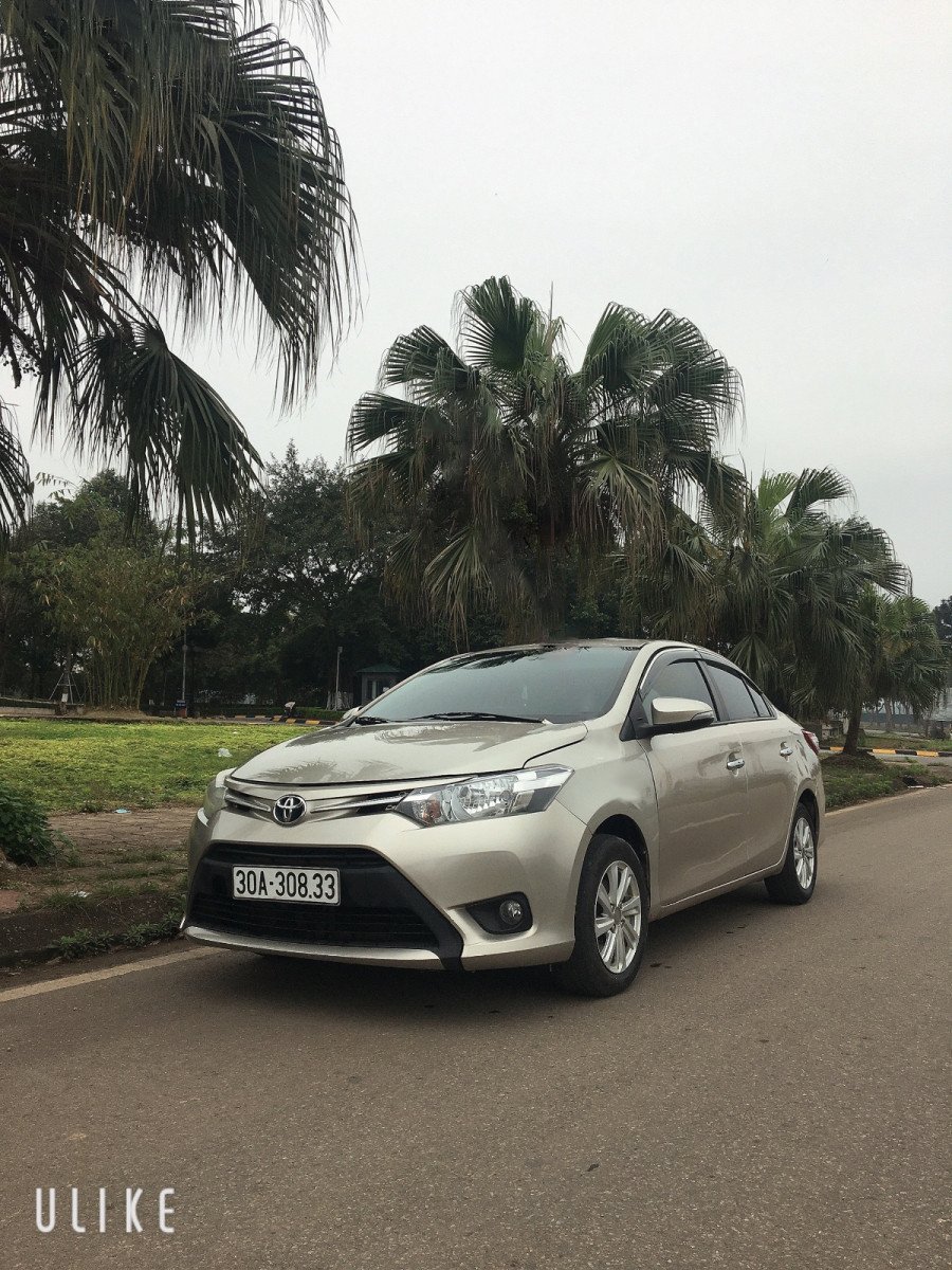 Toyota Vios 2014 - Cần bán xe Toyota Vios Limo năm 2014, màu vàng cát