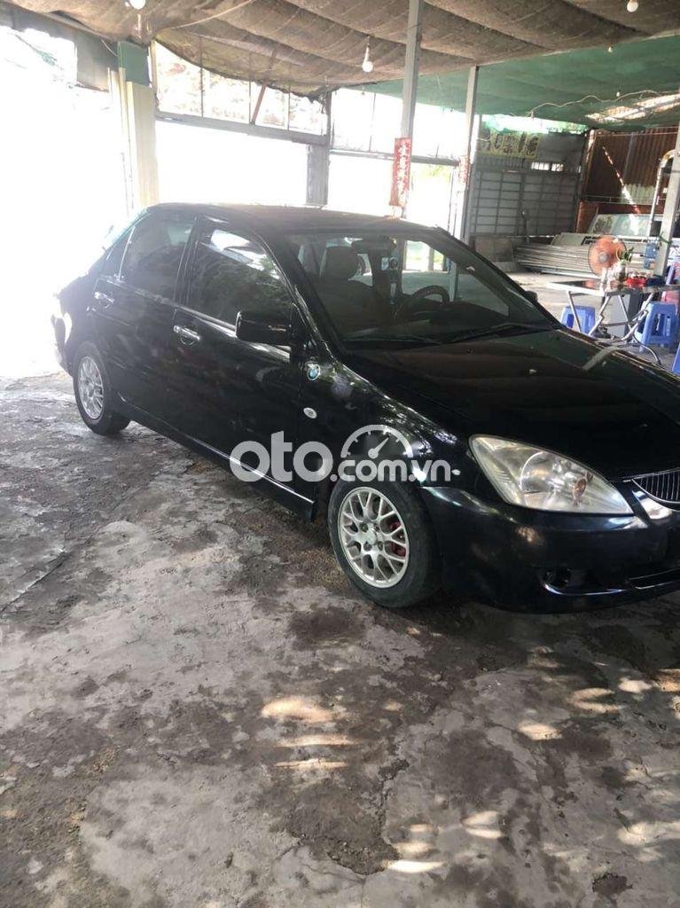 Mitsubishi Lancer 2005 - Màu đen, xe nhập, số sàn