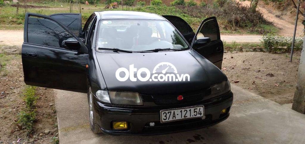 Mazda 323 1998 - Màu đen, giá cực tốt