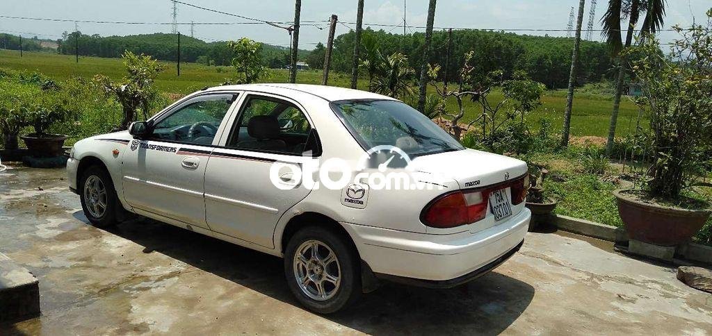 Mazda 323 2000 - Màu trắng