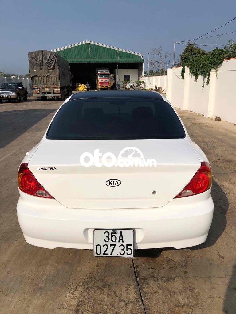 Kia Spectra 2003 - Xe màu trắng