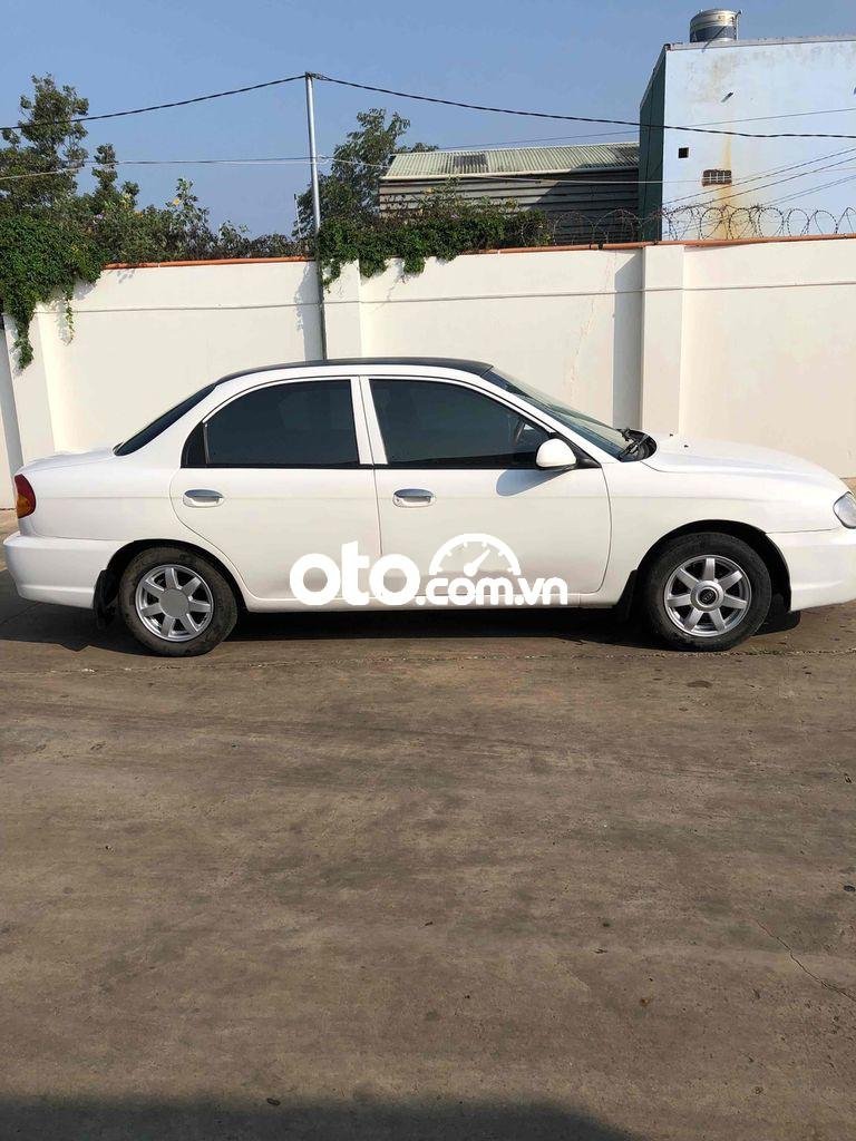 Kia Spectra 2003 - Xe màu trắng