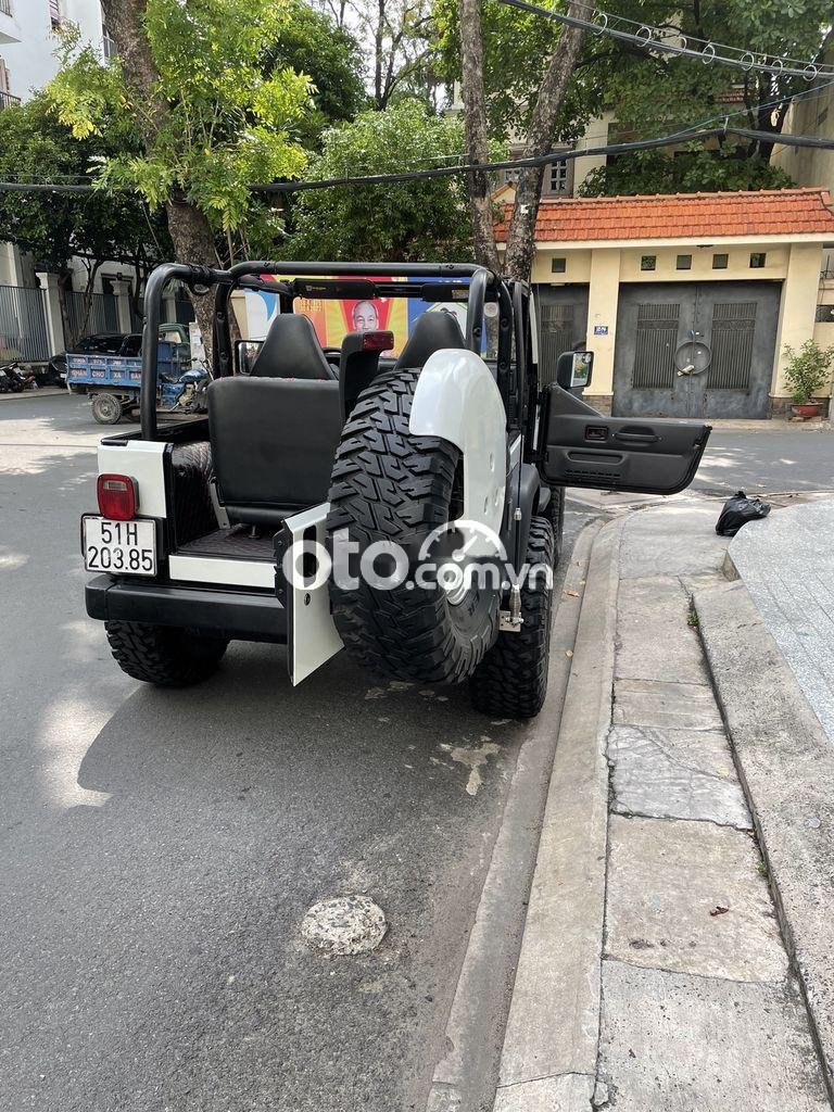 Jeep Wrangler 1990 - Màu trắng, giá cực tốt