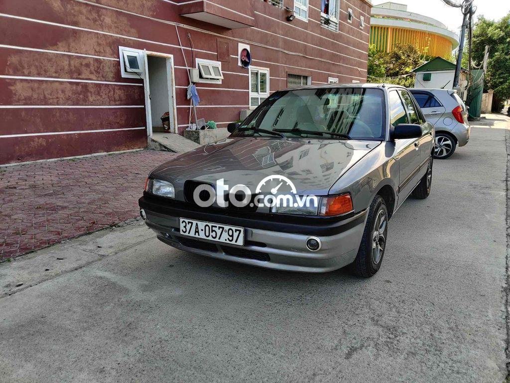 Mazda 323 1996 - Xe màu xám