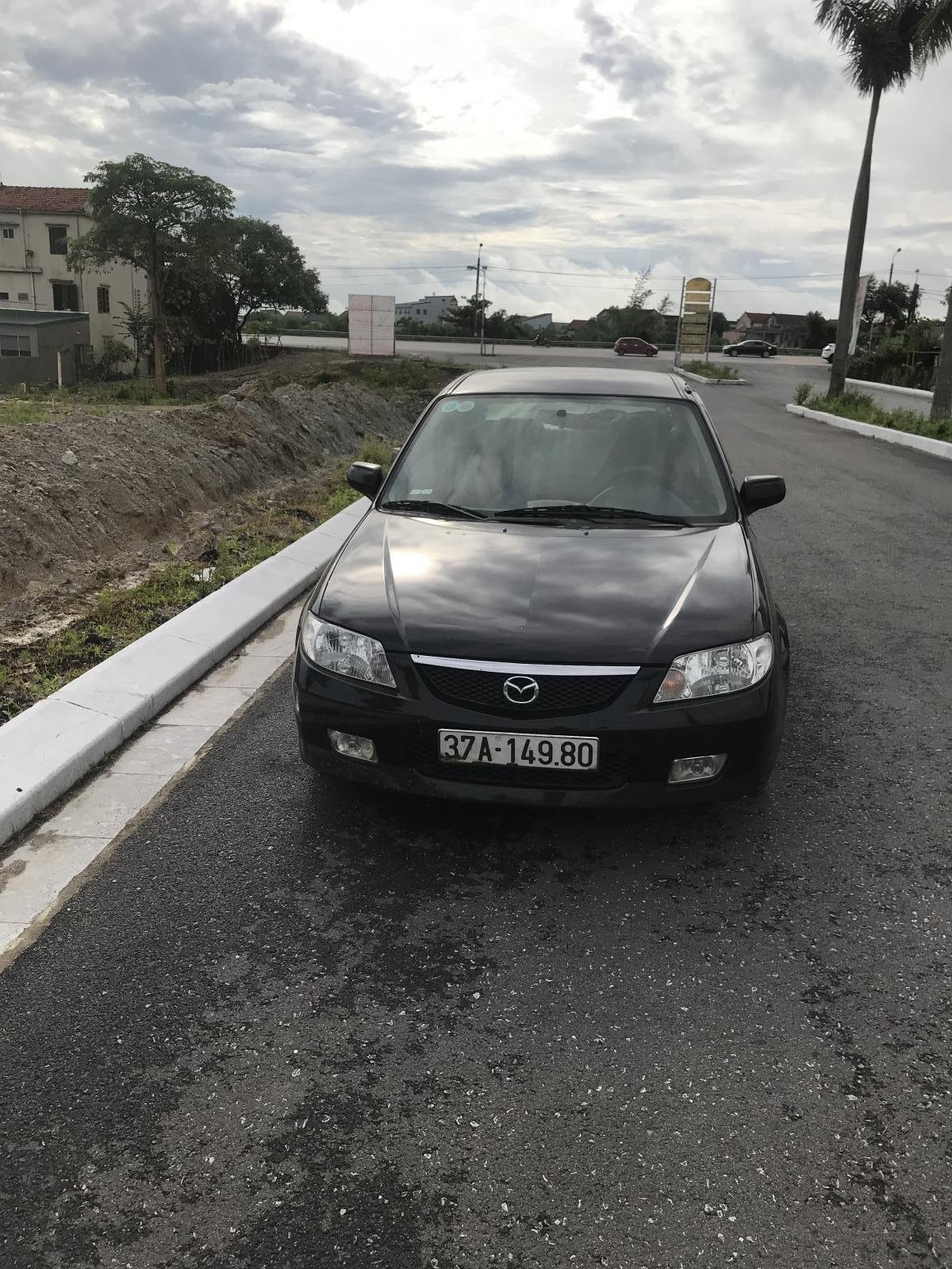 Mazda 323 2003 - Cần bán xe màu đen