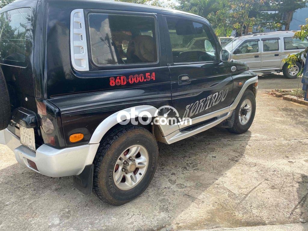 Ssangyong Korando 2003 - Màu đen, xe nhập