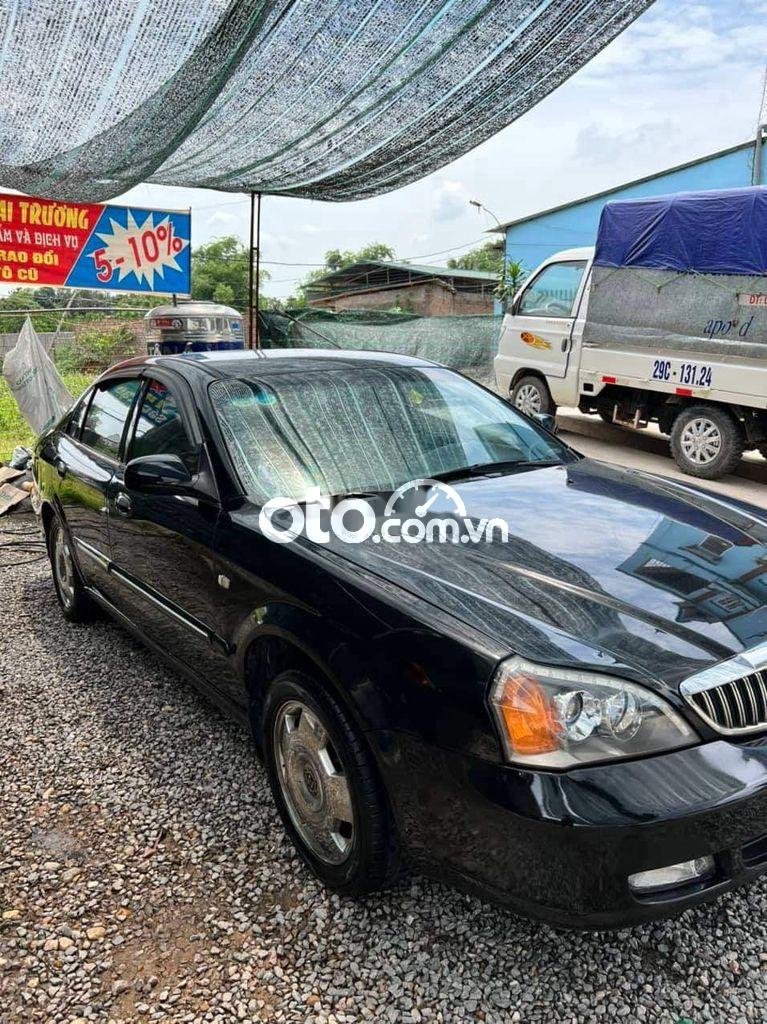 Daewoo Magnus 2004 - Màu đen, xe nhập, giá chỉ 129 triệu