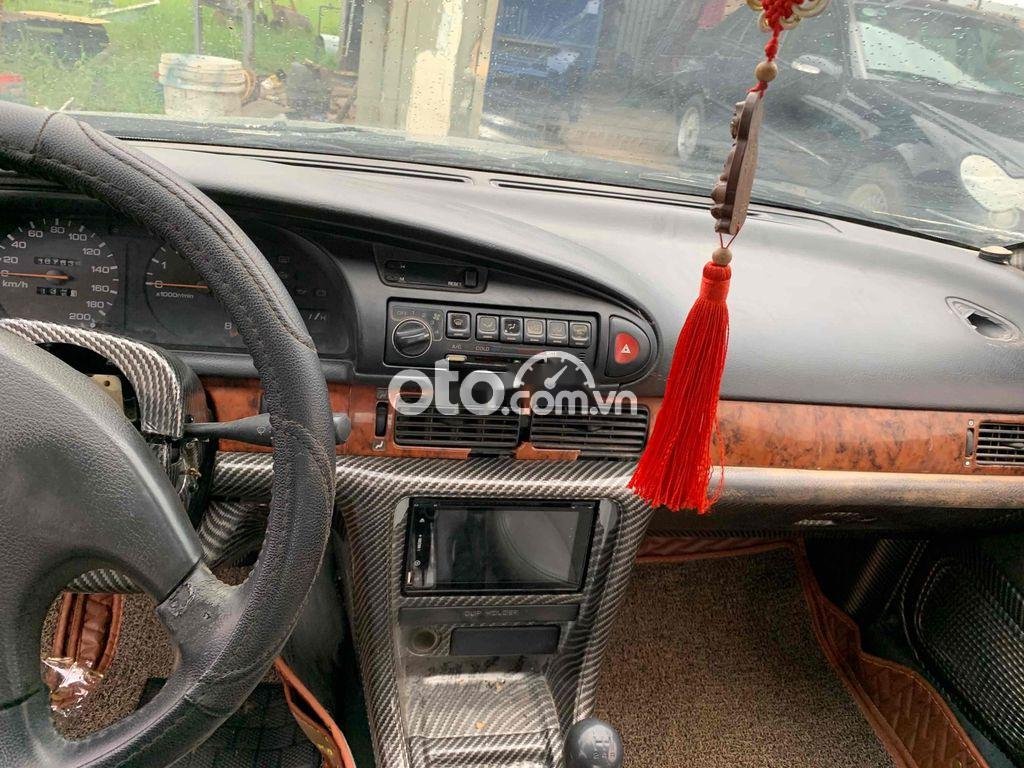 Nissan Bluebird 1993 - Màu bạc, xe nhập