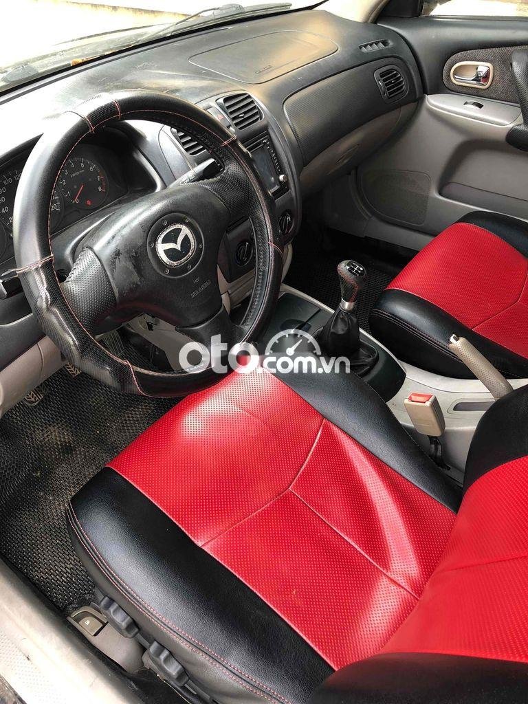 Mazda 323 2003 - Màu đen, giá chỉ 160 triệu