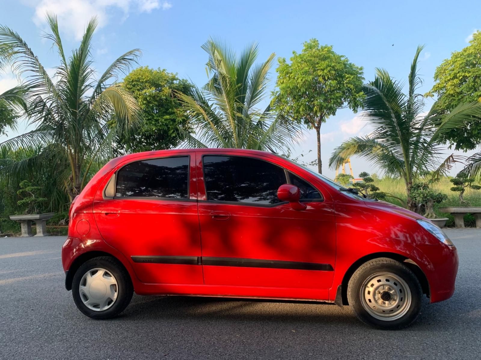 Chevrolet Spark 2011 - Che mưa che nắng