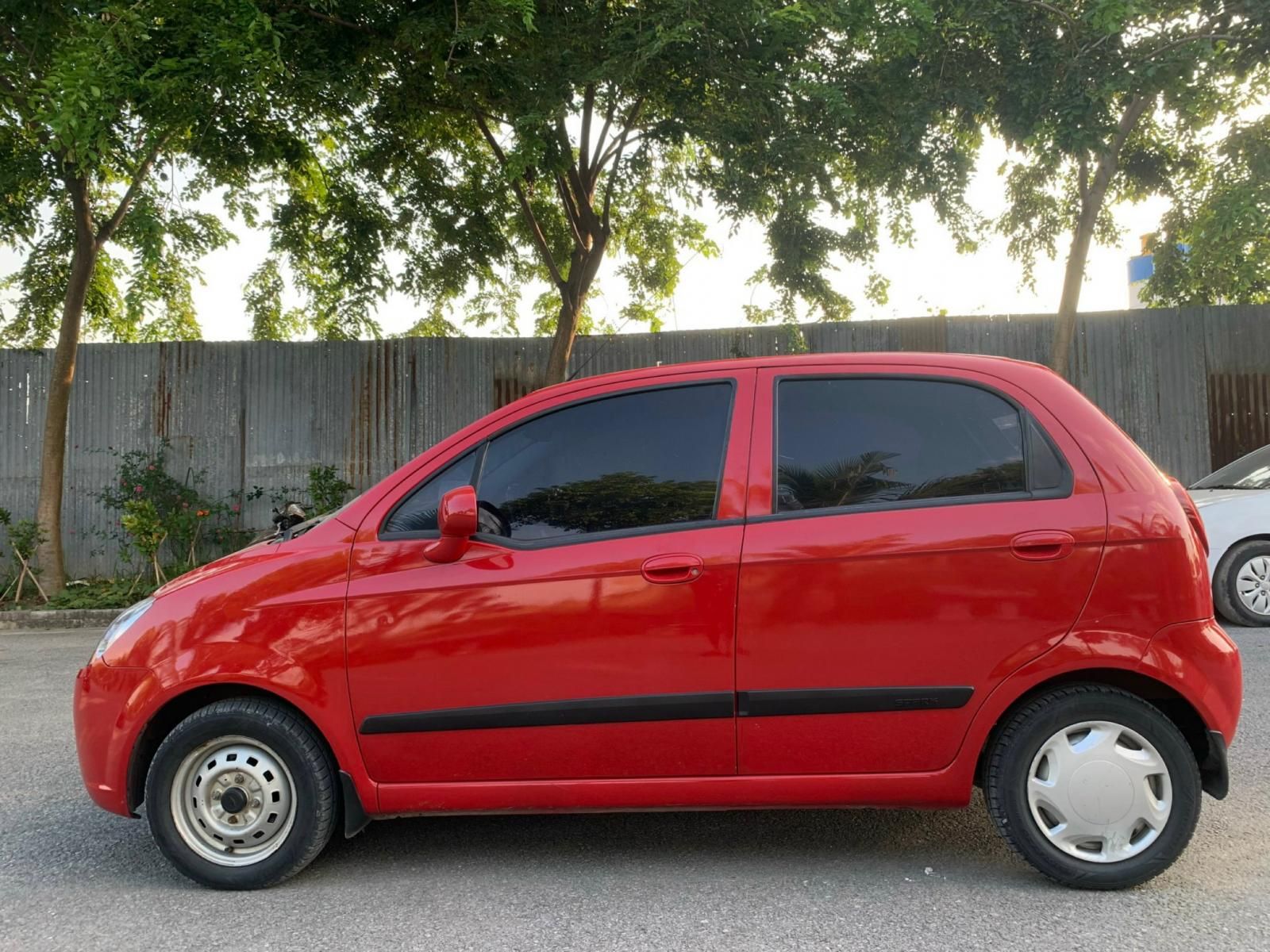 Chevrolet Spark 2011 - Che mưa che nắng