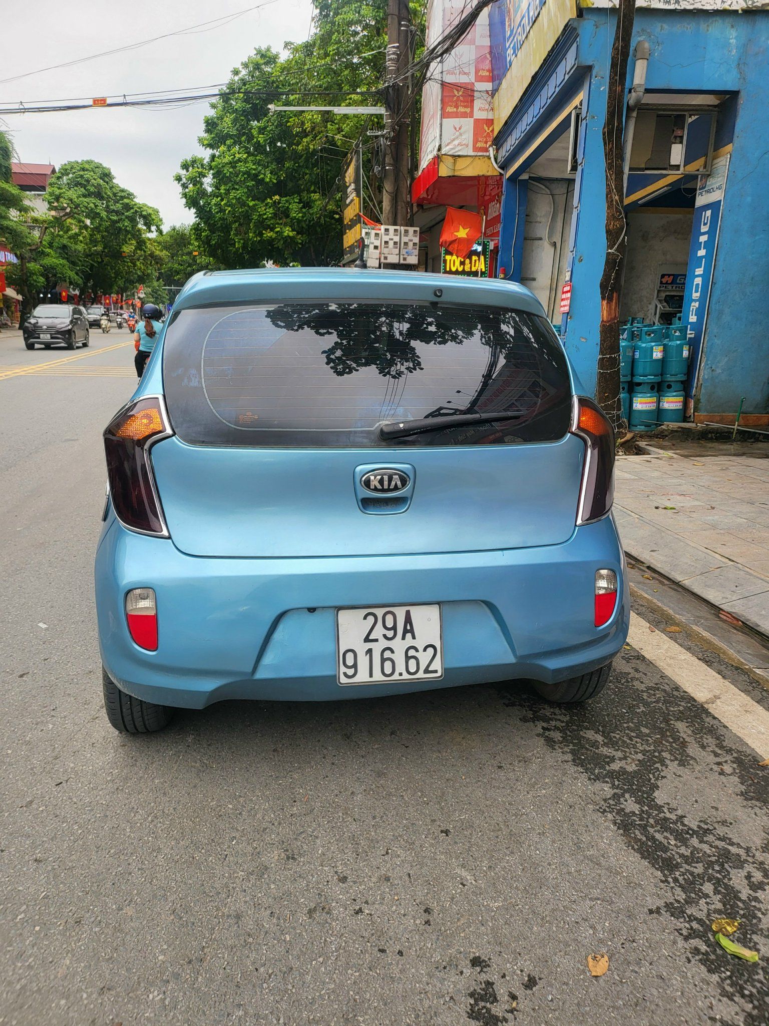 Kia Morning 2013 - Xe màu xanh