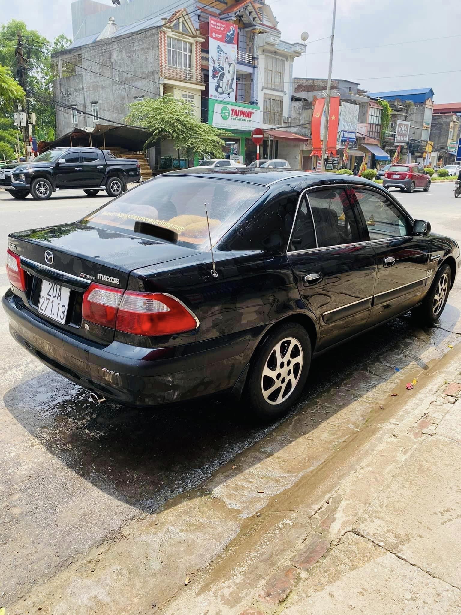 Mazda 626 2001 - Xe màu đen