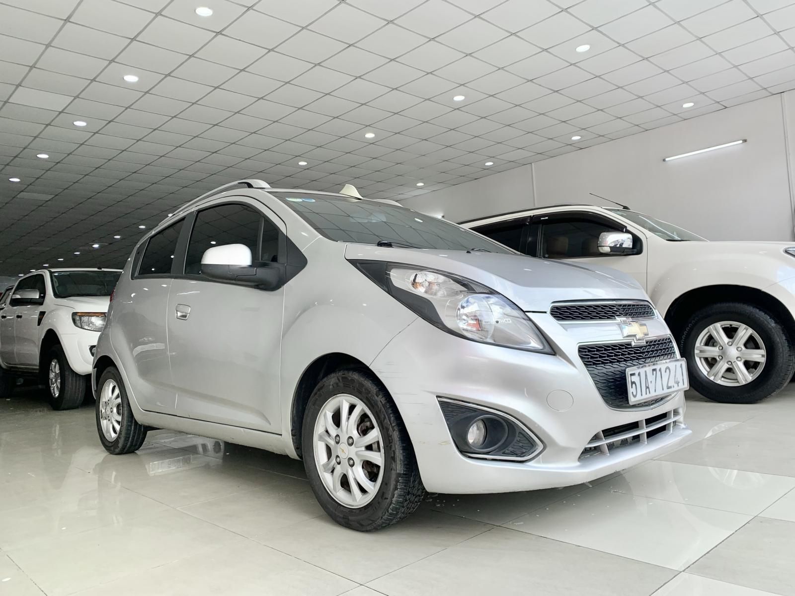 Chevrolet Spark 2013 - Cần tiền bán gấp xe gia đình đang sử dụng