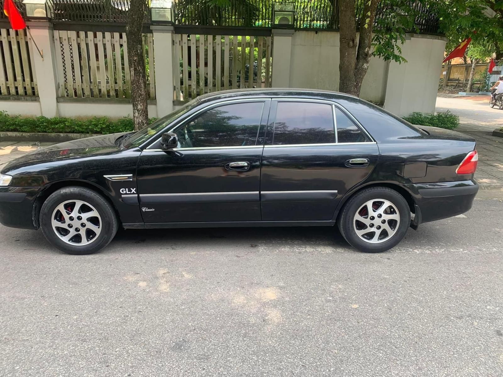 Mazda 626 2001 - Xe màu đen