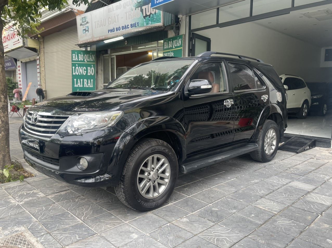 Toyota Fortuner 2014 - Cần bán xe màu đen