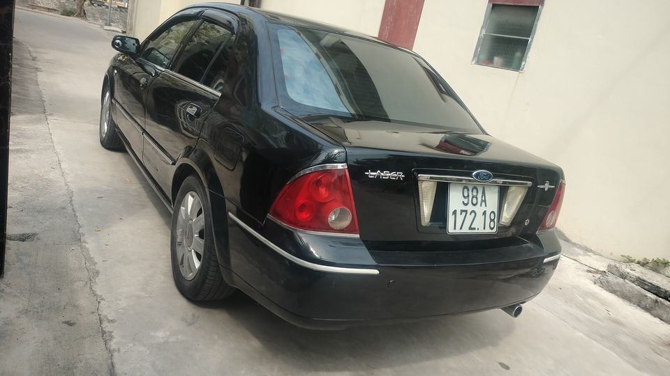 Ford Laser 2004 - Màu đen số tự động