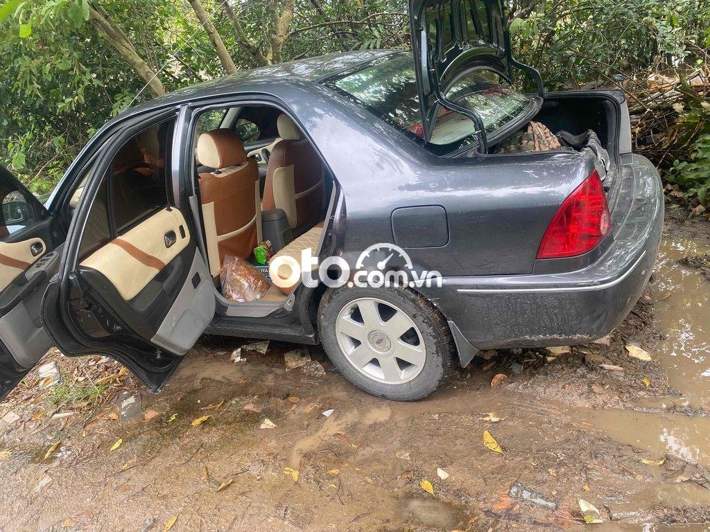 Ford Laser 2002 - Màu xám xe gia đình, giá 125tr