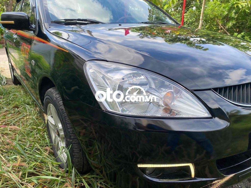 Mitsubishi Lancer 2004 - Màu đen xe gia đình