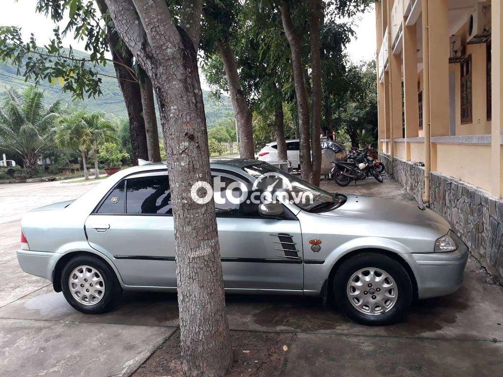 Ford Laser 2001 - Màu bạc, 125tr