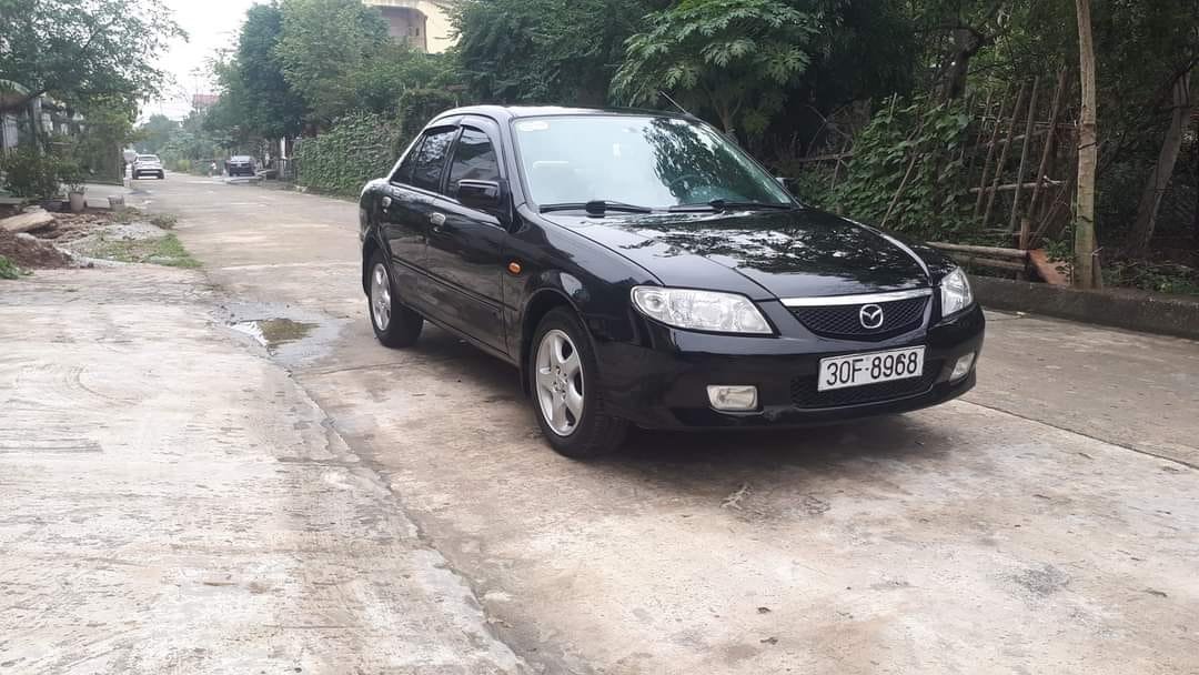 Mazda 323 2001 - Màu đen