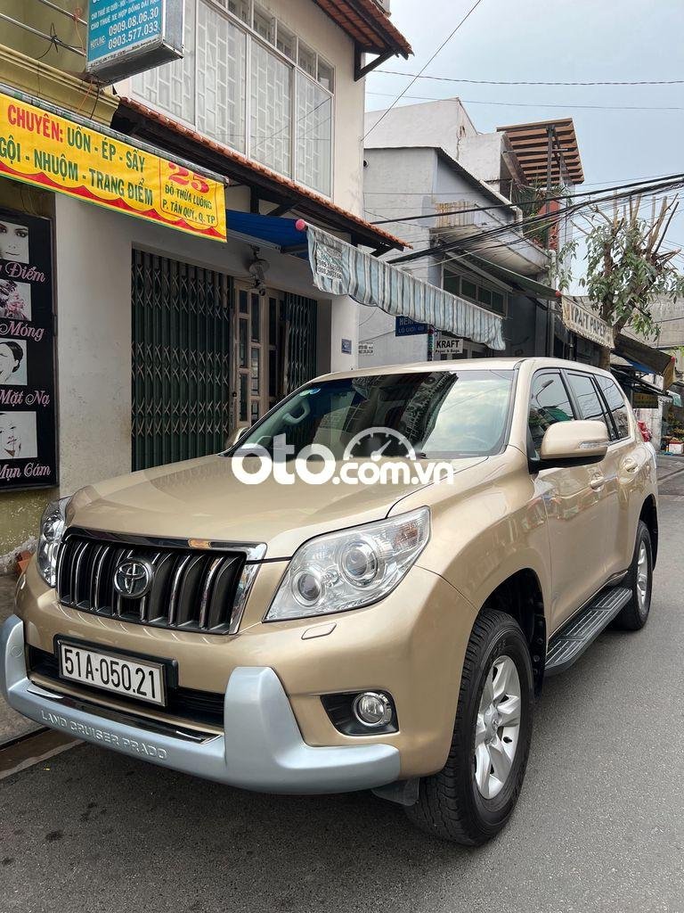 Toyota Land Cruiser Prado TXL 2010 - Bán xe Toyota Land Cruiser Prado TXL sản xuất năm 2010, màu vàng, nhập khẩu nguyên chiếc