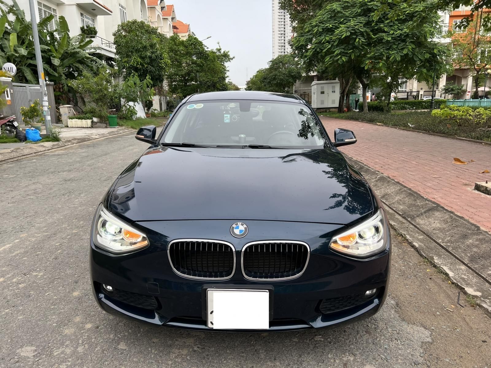 BMW 116i 2014 - Bản Hachback, màu xanh cavansite