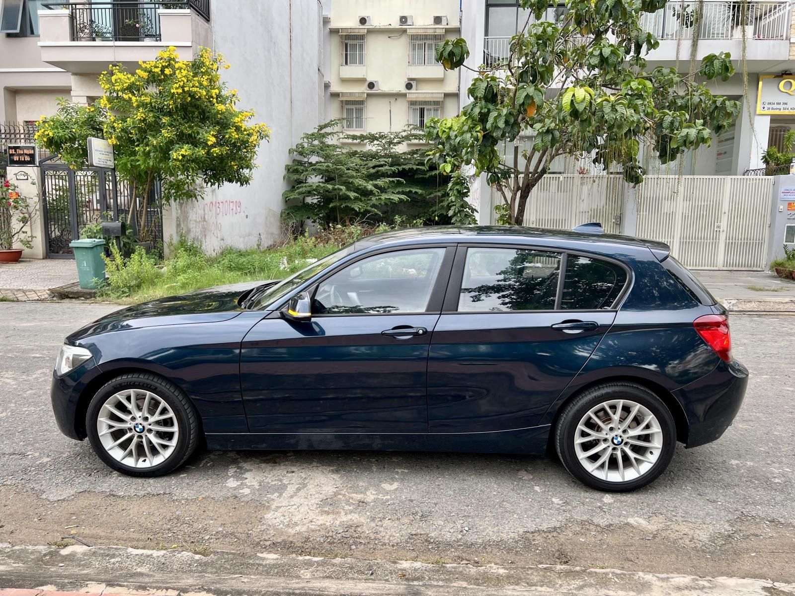 BMW 116i 2014 - Bản Hachback, màu xanh cavansite