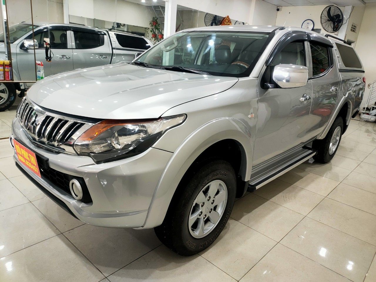 Mitsubishi Triton 2016 - Màu bạc, 445tr