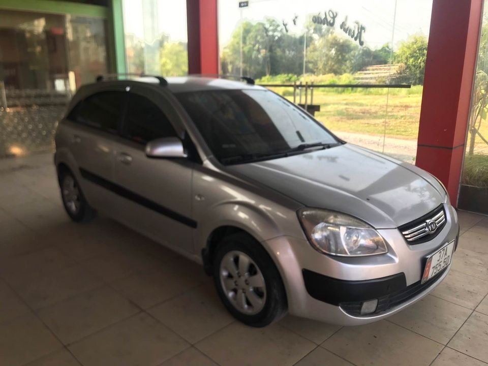 Kia Rio 2009 - Màu bạc, số tự động