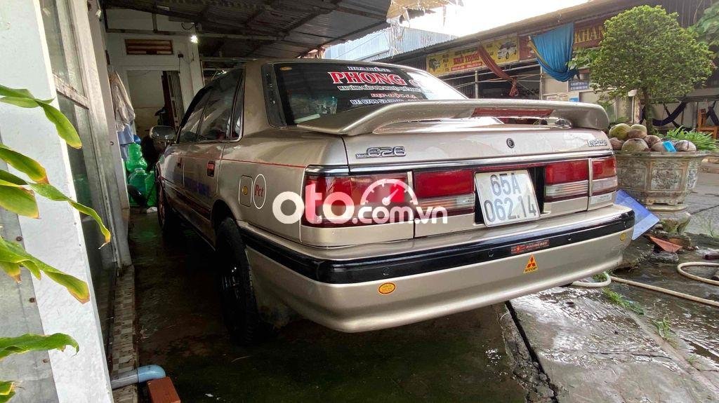 Mazda 626 xe chay du du .máy lạnh am am.xe di xa thoi mai 1993 - xe chay du du .máy lạnh am am.xe di xa thoi mai