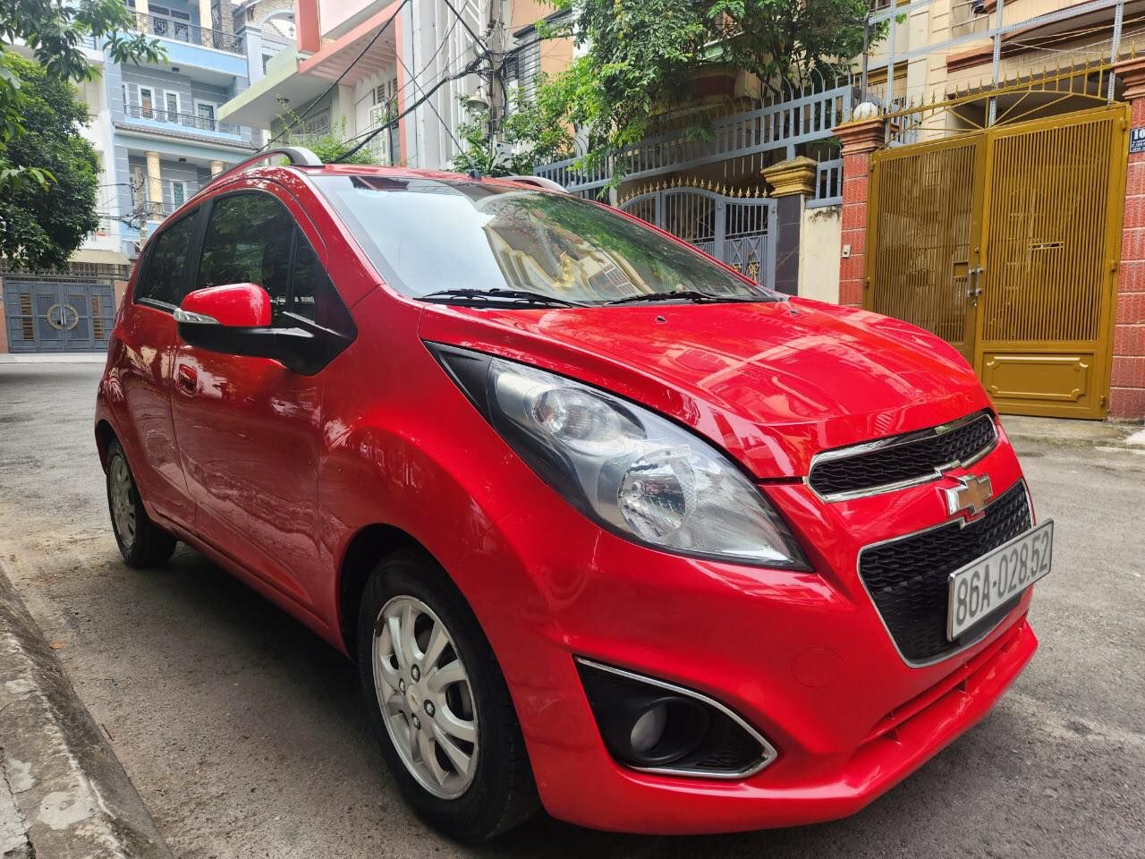 Chevrolet Spark 2014 - Cần bán xe auto, màu đỏ, gia đình sử dụng mới 95%