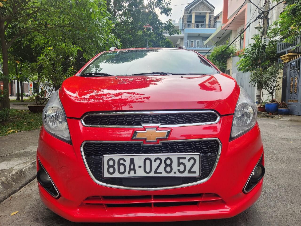 Chevrolet Spark 2014 - Cần bán xe auto, màu đỏ, gia đình sử dụng mới 95%