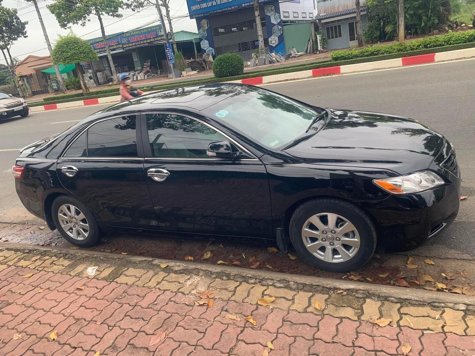 Toyota Camry 2007 - Xe số tự động, màu đen, xe máy zin bao đẹp, cửa sổ trời, odo 94.000km, coi xe TP Bà Rịa