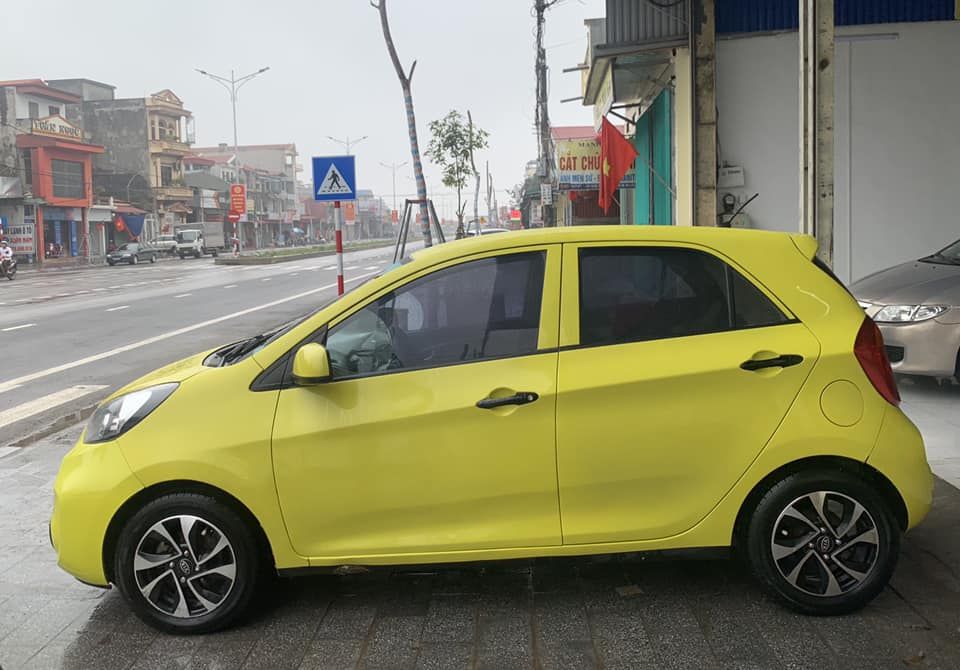 Kia Morning 2015 - Xe màu vàng