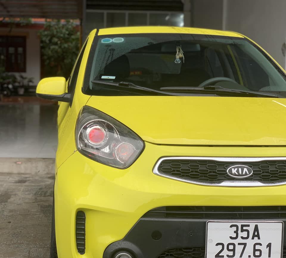 Kia Morning 2015 - Xe màu vàng