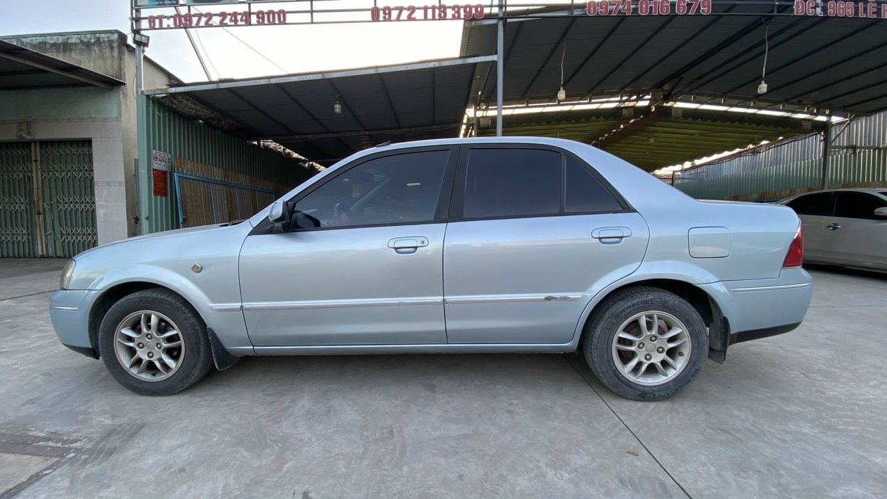 Ford Laser 2004 - Màu bạc, 145 triệu