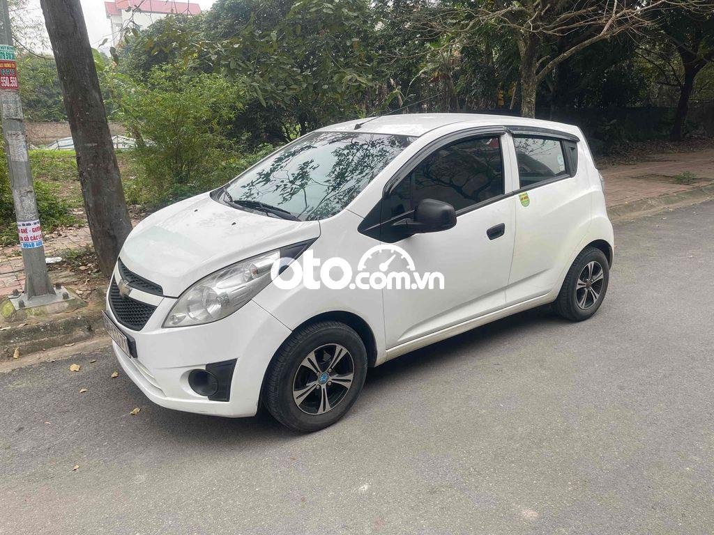 Chevrolet Spark hết tiền cần bán xe 2012 - hết tiền cần bán xe