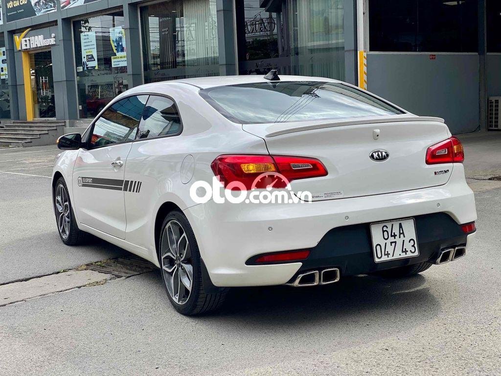 Kia Cerato Koup Xe thể thao 2 cửa  màu trắng mới cứng 2014 - Xe thể thao 2 cửa Cerato Koup màu trắng mới cứng