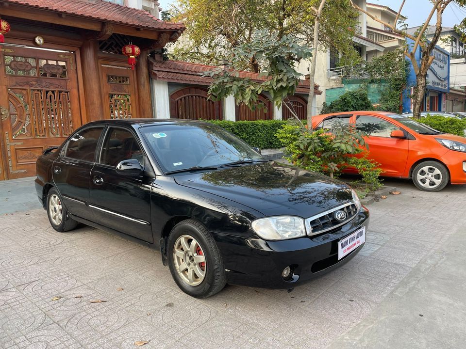 Kia Spectra 2005 - Màu đen, giá 77tr