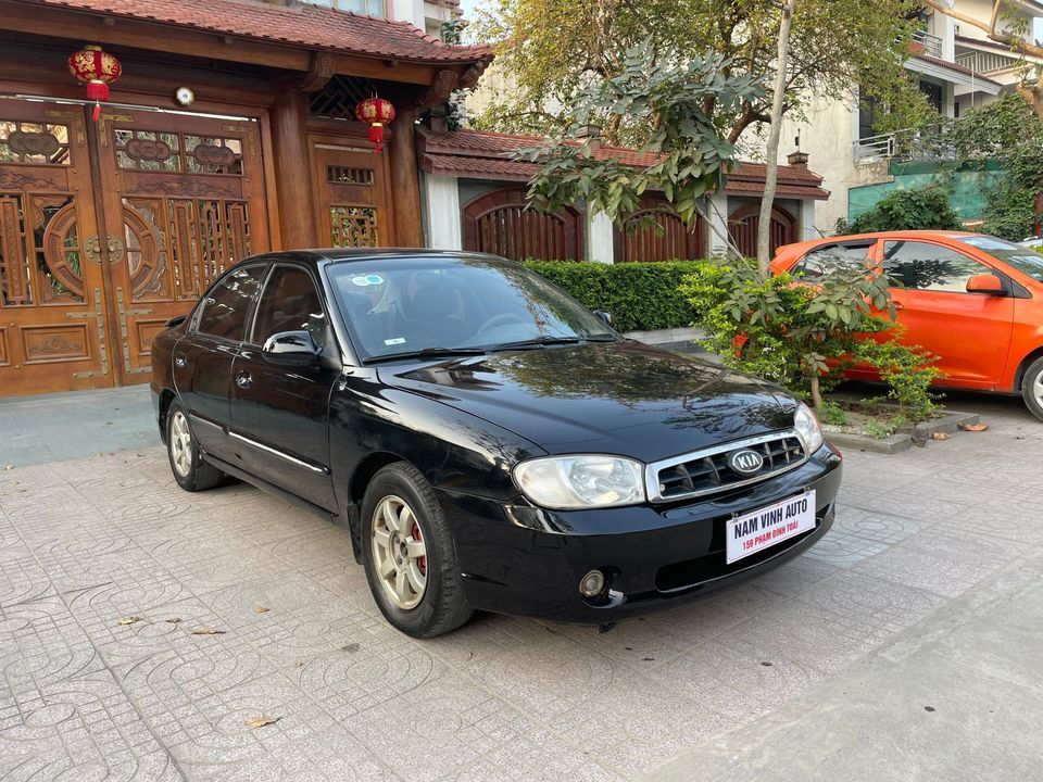 Kia Spectra 2005 - Màu đen, giá 77tr