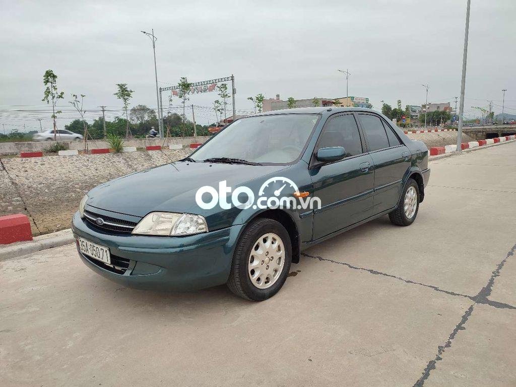 Ford Laser   1.6 cá nhân dùng. Máy móc gầm bệ ngon 2000 - Ford laser 1.6 cá nhân dùng. Máy móc gầm bệ ngon