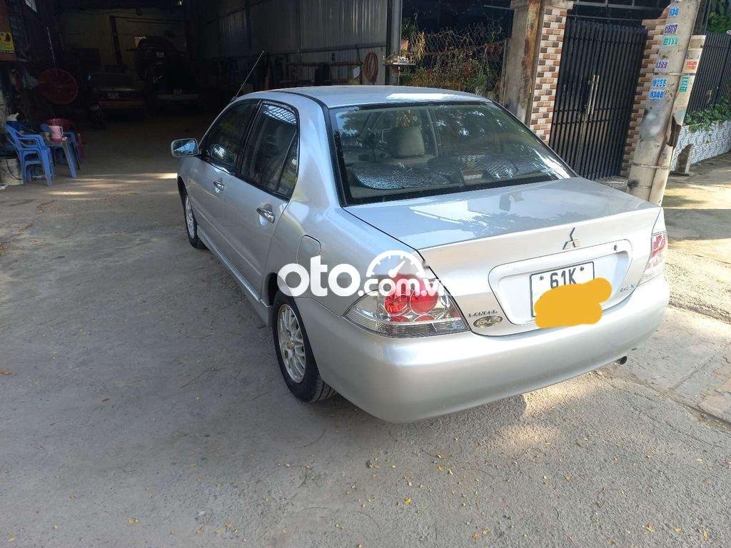 Mitsubishi Lancer Cần bán xe   2004 số tự động 2004 - Cần bán xe mitsubishi lancer 2004 số tự động