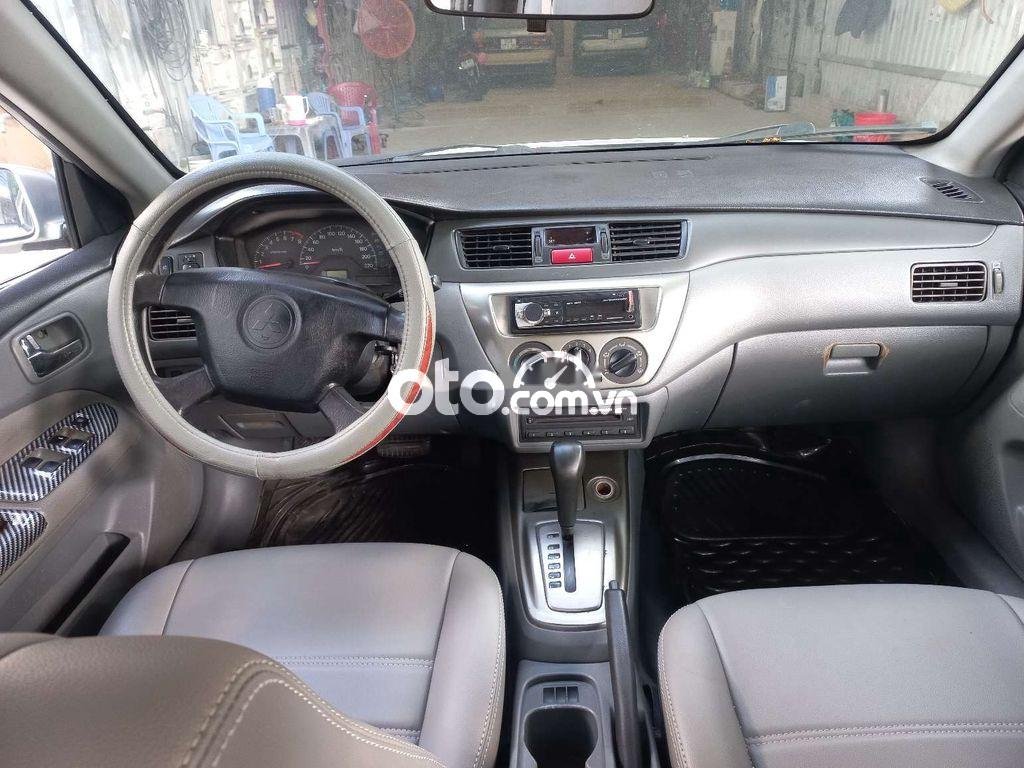 Mitsubishi Lancer Cần bán xe   2004 số tự động 2004 - Cần bán xe mitsubishi lancer 2004 số tự động