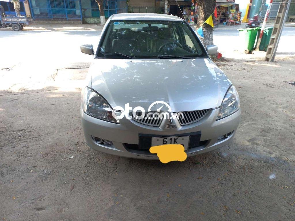 Mitsubishi Lancer Cần bán xe   2004 số tự động 2004 - Cần bán xe mitsubishi lancer 2004 số tự động
