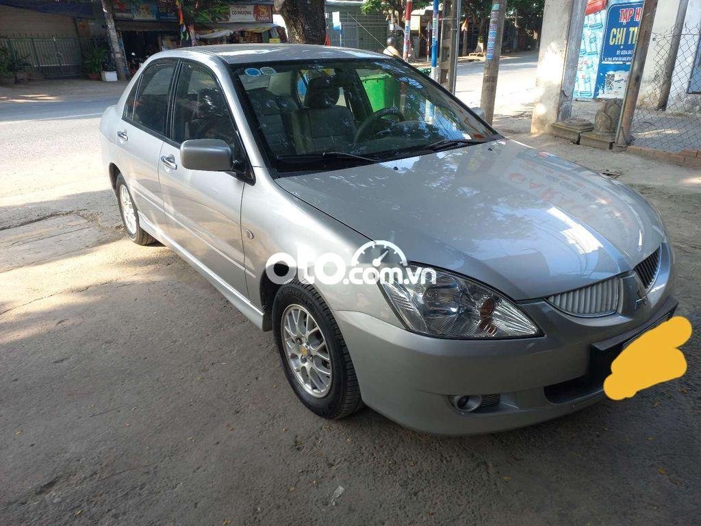 Mitsubishi Lancer Cần bán xe   2004 số tự động 2004 - Cần bán xe mitsubishi lancer 2004 số tự động