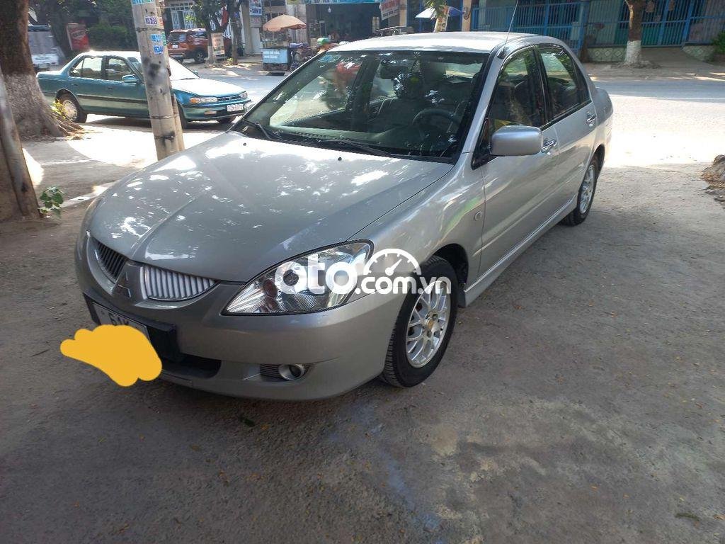 Mitsubishi Lancer Cần bán xe   2004 số tự động 2004 - Cần bán xe mitsubishi lancer 2004 số tự động