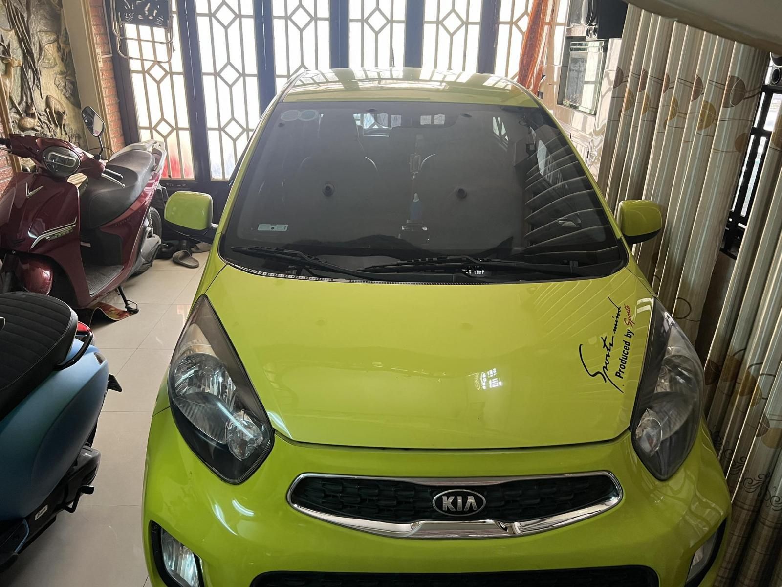 Kia Morning 2015 - Màu xanh, gia đình sử dụng