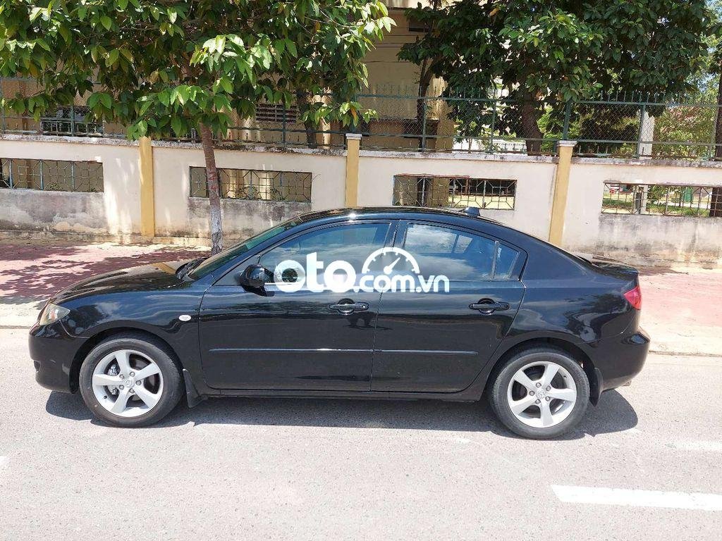 Mazda 3 Cần bán  ,màu đen,đời 2005 2005 - Cần bán mazda 3,màu đen,đời 2005