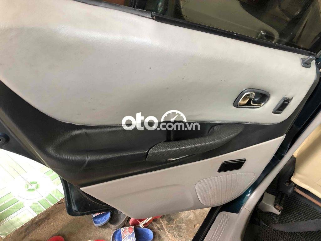 Ford Laser cần bán xe   bản deluxe, xe đẹp, chạy phe 2001 - cần bán xe ford laser bản deluxe, xe đẹp, chạy phe